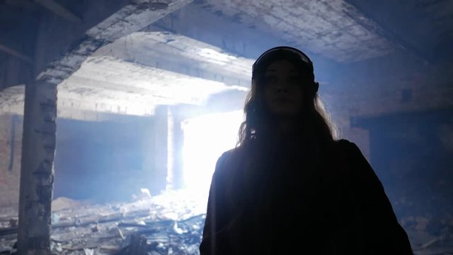 Woman in underground tunnel silhouette