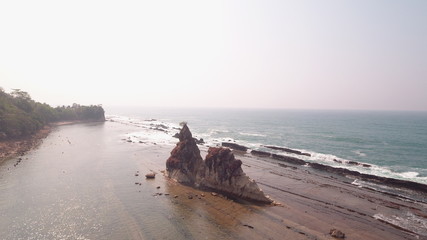 two beautiful large stones on the shoreline