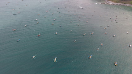 fishermen and their boats in the sea to get fish