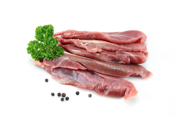 duck breast raw and cut on a white background