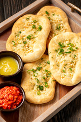 Homemade naan bread with garlic and butter.