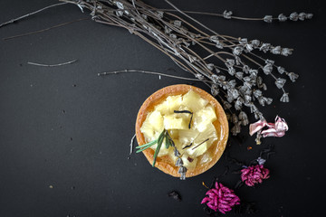 gold ring with diamonds on black background