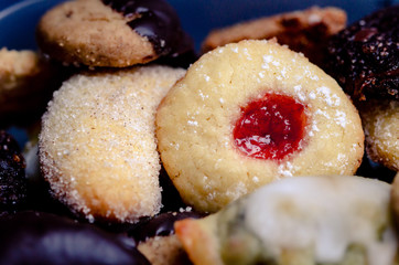 Sweet mixed christmas cookies with chocolate decoration