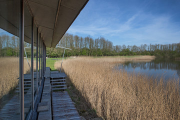 Lake and estate. Modern Dutch architecture. Netherlands. Dwingeloo