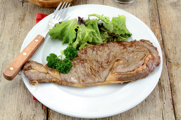 steak of grilled beef on a plate