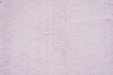 Obraz premium Decorative colored plaster on the wall. Textured lilac background. Abstract purple background.