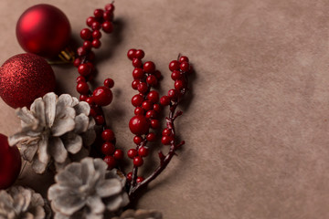 Christmas bauble with pine cones on a soft background