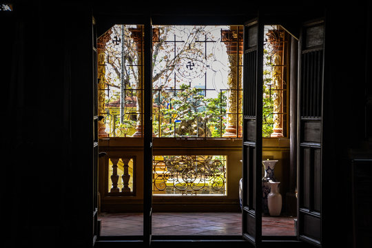 View Out Of Vietnamese Temple Through Triple Door