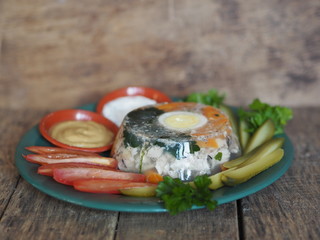 aspic fish meat on a wooden rustic table