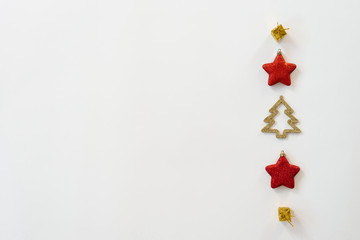 Naklejka na ściany i meble Christmas composition. Pattern with Christmas tree toys on a white background. Flat position, top view, copy space