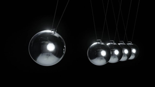 cause and effect concept, swinging metal Newton?s Cradle in slow motion studio shot design, on black background, 4k loop