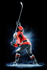 ice hockey player isolated on black background © 103tnn