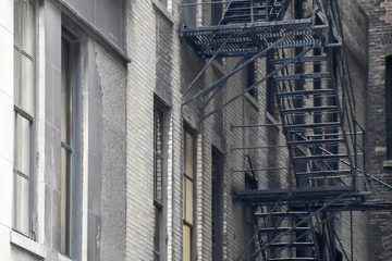 Naklejka premium Fire Escape Stairs Outside Building Facade