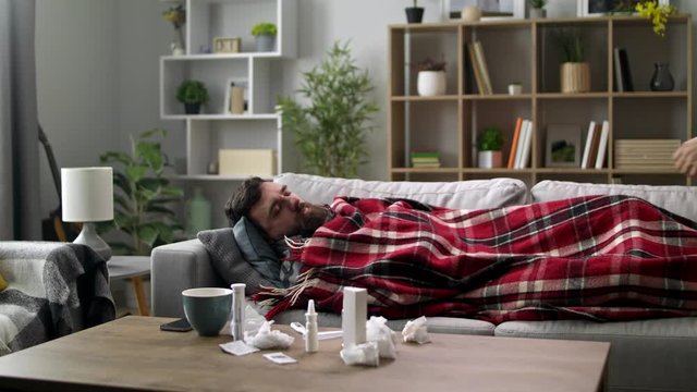 Girlfriend checks temperature with her cold boyfriend