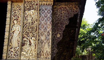 Golden wall decoration near the "Wat Xieng Thong" in Laos.