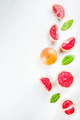 Whole and sliced grapefruit