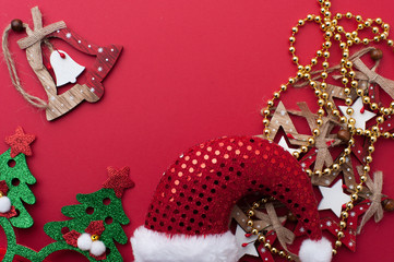 Christmas Headband, Funny Glasses With Green Trees and Wooden Toys on Red Background.