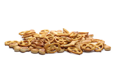 Salty cracker and pretzel snacks, party mix isolated on white background