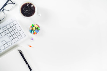 Office creative desk with supplies and coffee cup