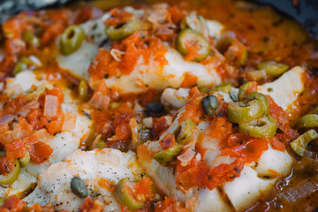 Close-up of pescado a la veracruzana, fish recipe prepared in Mexico