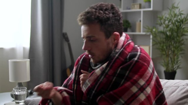 Sick man uses cough pill