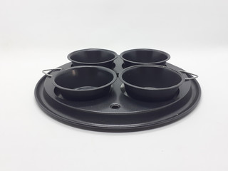 Black Metallic Frying Cake or Egg Maker Pan with Multiple Containers for Kitchen Utensils in White Isolated background