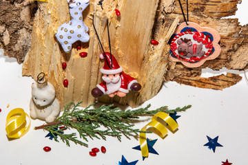 Christmas tree and toys on wooden background