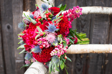 Wedding. The bride's bouquet. Wedding bouquet rustic style with red peonies