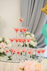 rose wine fountain at a wedding cocktail