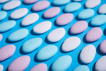 Blue, white and pink spa stones on a background