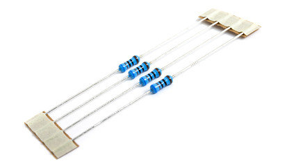 Resistor as electronic component in metal film version on white background