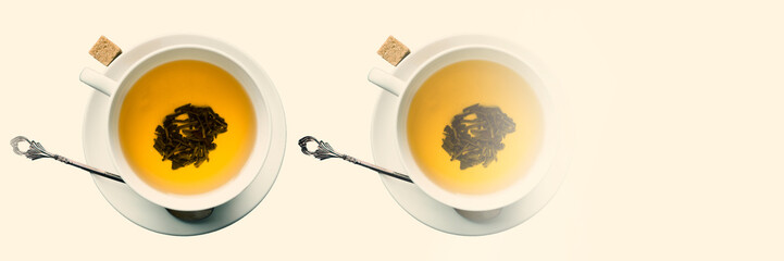 White porcelain cup with green tea and sugar cubes on wooden table. Top view.
