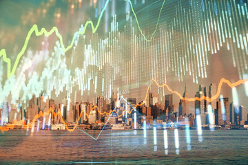 Forex chart on cityscape with skyscrapers wallpaper double exposure. Financial research concept.