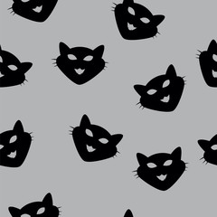 Seamless Pattern of black cat heads on grey background. Vector illustration. Animal silhouette. Wallpaper and fabric design and decor.