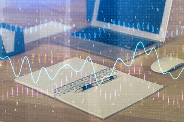Multi exposure of chart and financial info and work space with computer background. Concept of...
