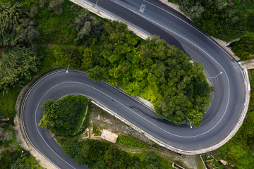 Curves road in Mellieha city. Aerial view. No cars. Clean highway. Malta island
