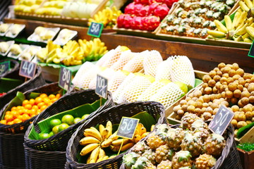 Variety of Thai fruits in a wooden picket
