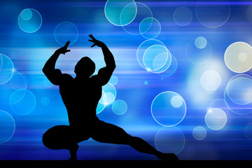 Silhouette of bodybuilder with blue light background