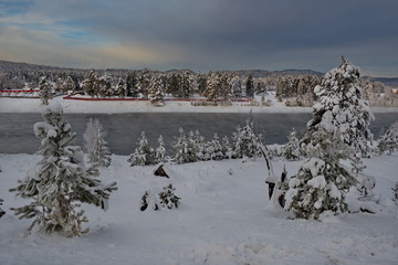Russia. Mountain Altai, early winter morning in the village of Kebezen on the Bank of the Biya river