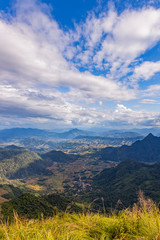 Small village in the middle of the valley in Laos, when viewed from the Thai side