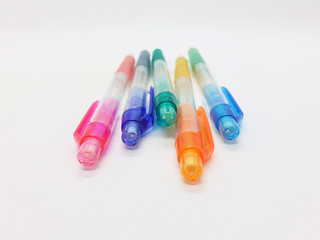 Naklejka premium Hand Holding Colorful Artistic Pens for Coloring and Drawing Tools in White Isolated Background