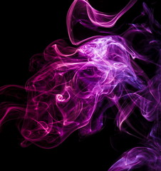 Colored smoke on black background