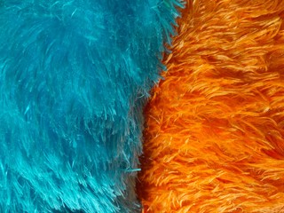Soft fur background in orange and blue
