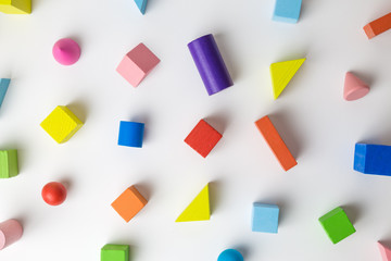 Multicolored set of 3D shapes toy abstract pattern background.