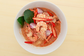 Spicy and spicy shrimp soup on the wooden table , Thai  food,Top view