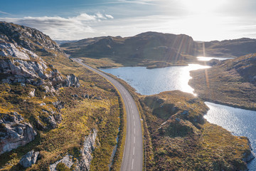 Drone Shoot Over Scottish Highlands Road at Autumn - 305695924