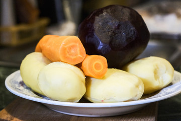 boiled eggs potatoes and carrots on a plate