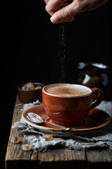 Coffee cup cappuccino with cinnamon, vintage style effect picture