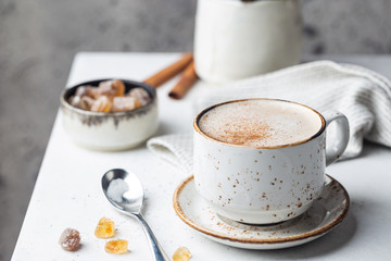 Coffee cup cappuccino with cinnamon, vintage style effect picture