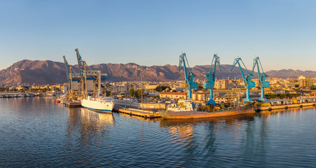 Fototapeta na wymiar Port cargo cranes in Palermo